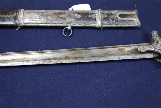 A 19th century silver mounted shasqua, probably Caucasian, sword 35in.